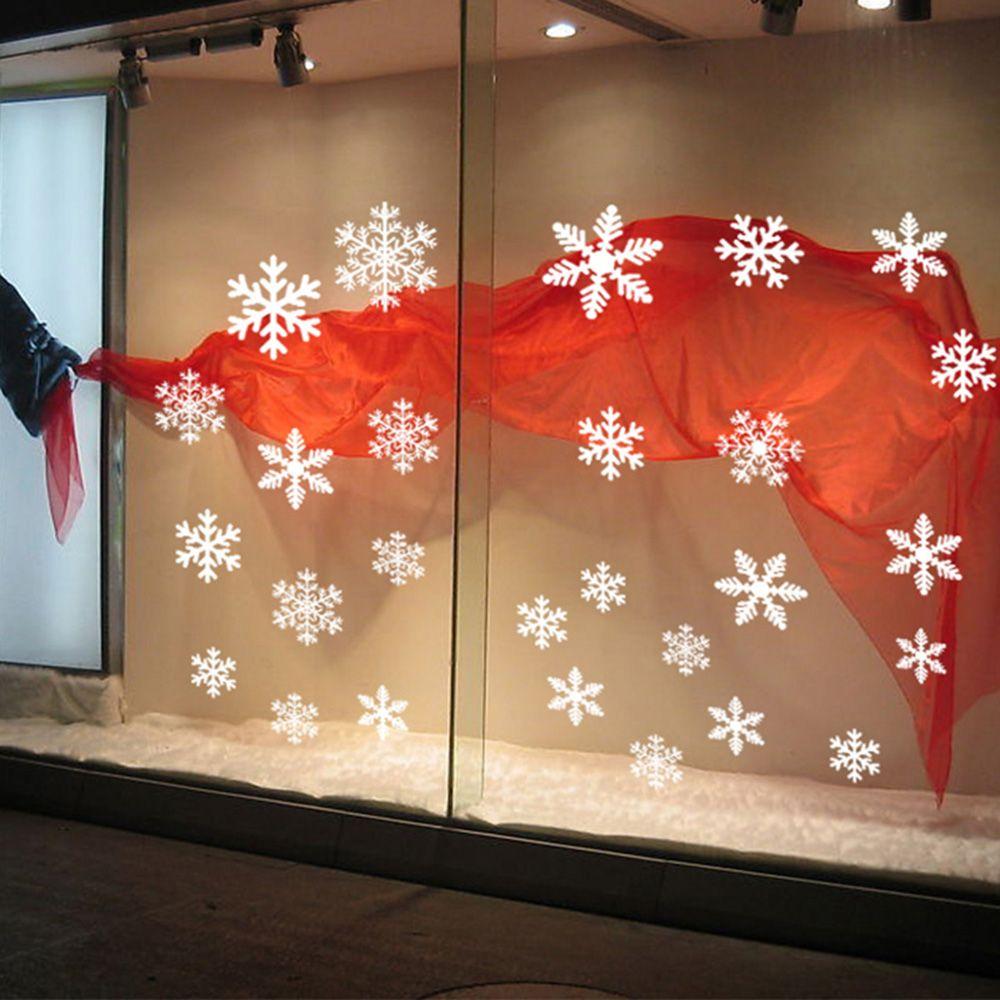 رقائق الثلج الشارات للديكور ال - مراجعة Snowflake Window Decal وسعره